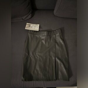 Naked wardrobe mini skirt cut out leather